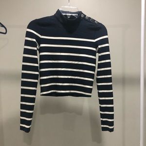 Turtleneck crop top with button detail